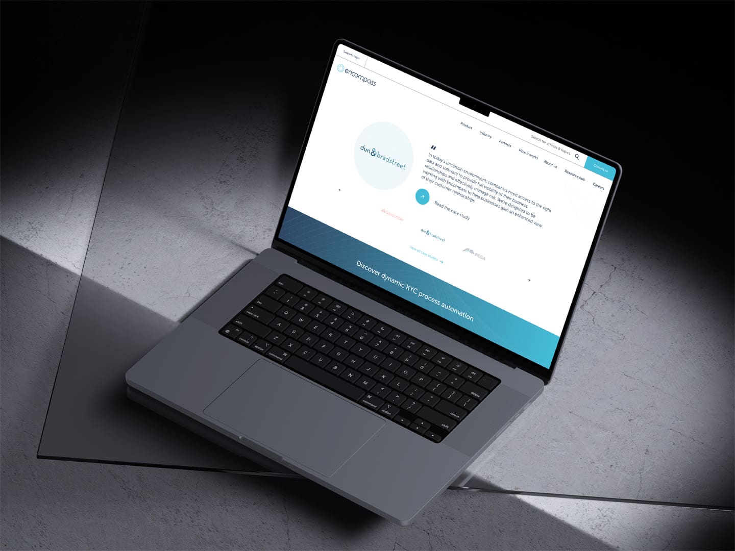MacBook Pro laptop illustrating the Encompass Corporation website