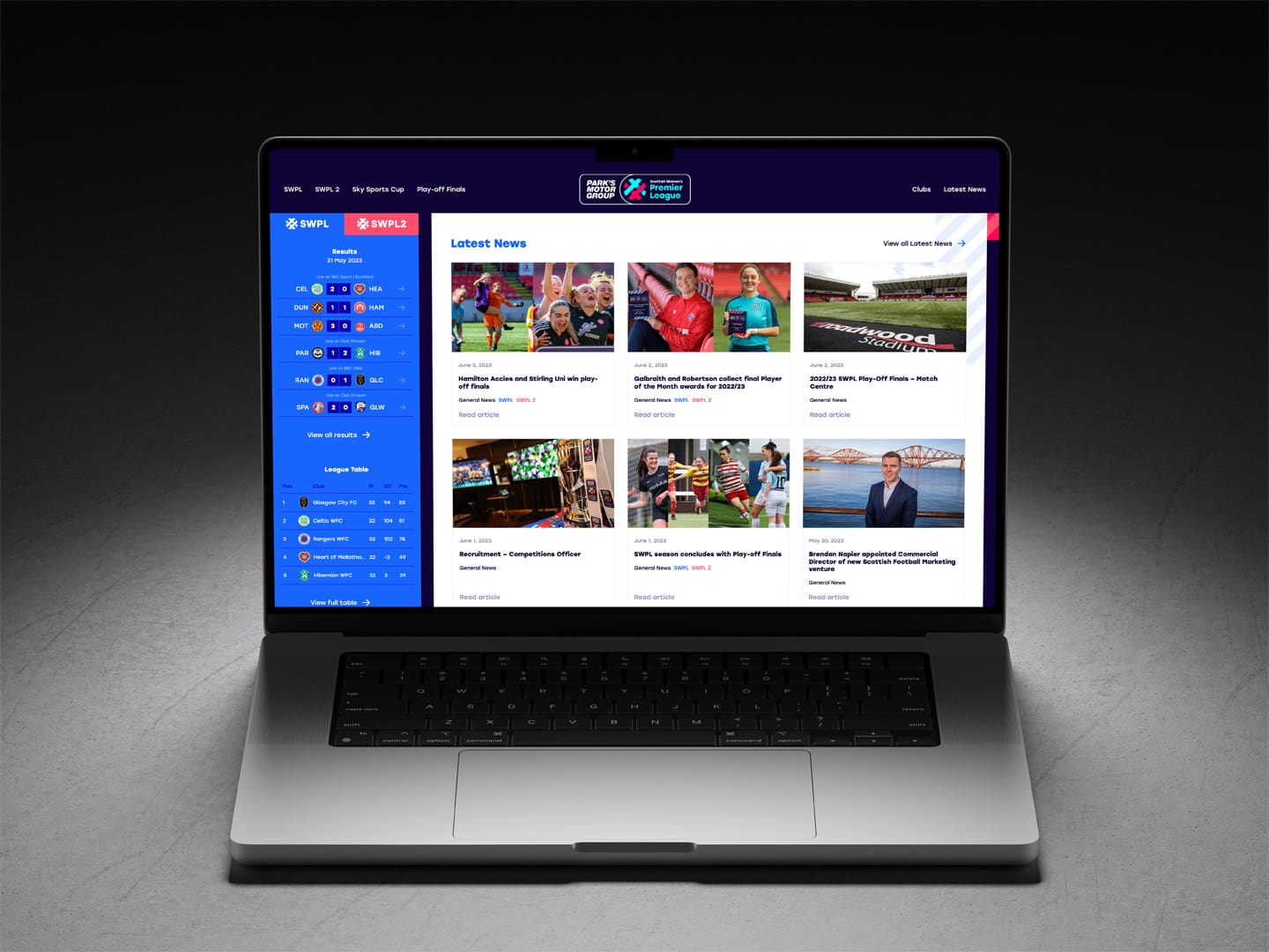 MacBook Pro laptop illustrating the Scottish Women's Premier League (SWPL) website